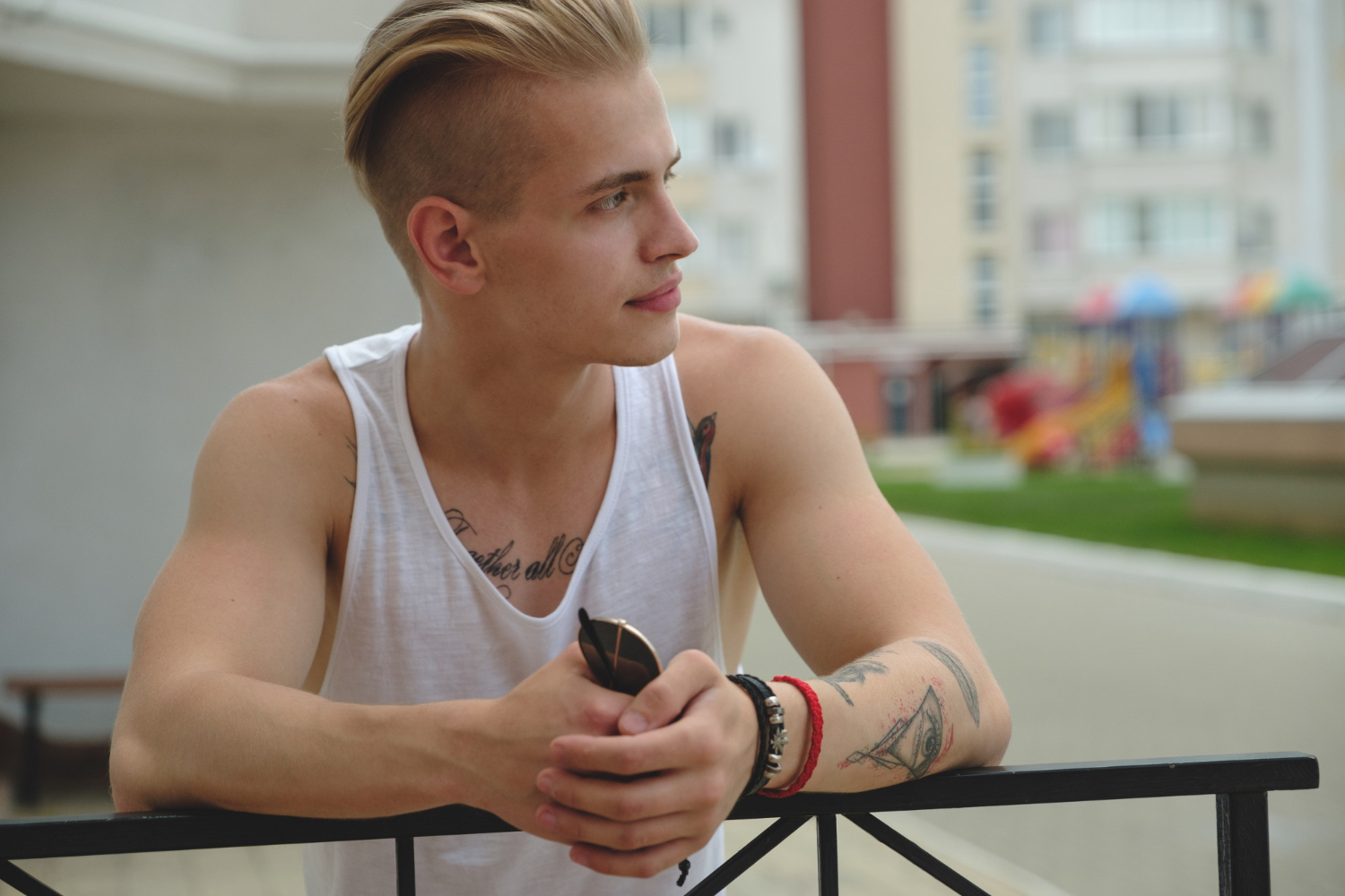 A man sitting outdoors while considering a new dating connection